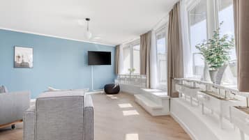 One-Bedroom Suite XL with terrace | Woonruimte | Een smart-tv