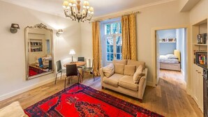 Apartment, 2 Bedrooms | Living area | Flat-screen TV - Cosy Modern Stockbridge Apartment (Edinburgh)