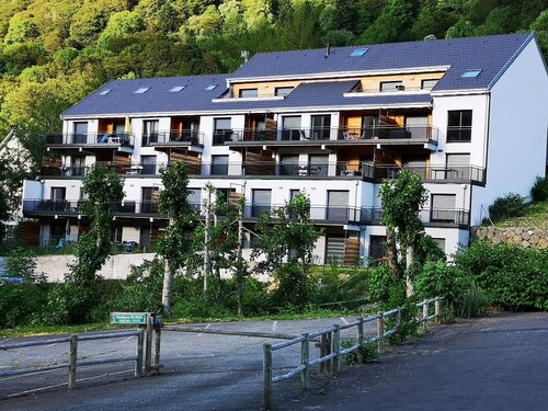 Large new T2 4 * near Mont Dore ski resort with private parking