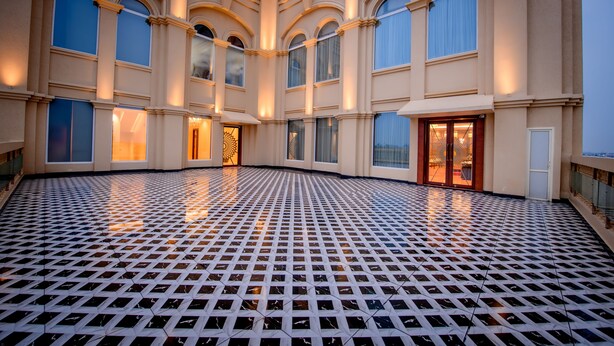 A spacious atrium with a patterned floor, large windows, and a grand entrance. - Best Western Kapurthala (Kapurthala)