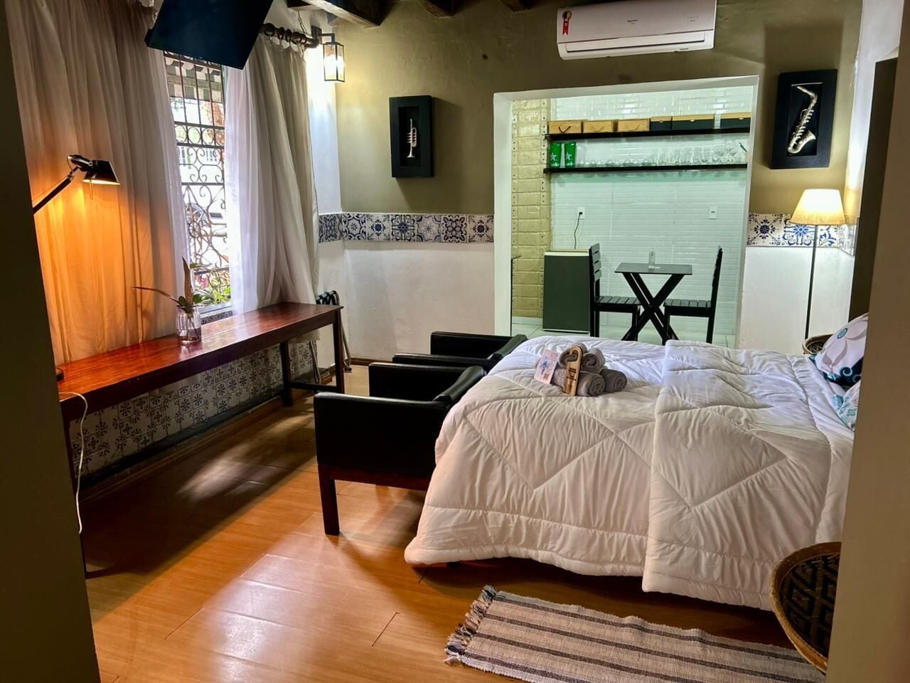 Habitación cuádruple Deluxe | Ropa de cama de alta calidad, colchones viscoelásticos, minibar