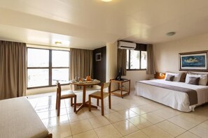 Minibar, desk, bed sheets