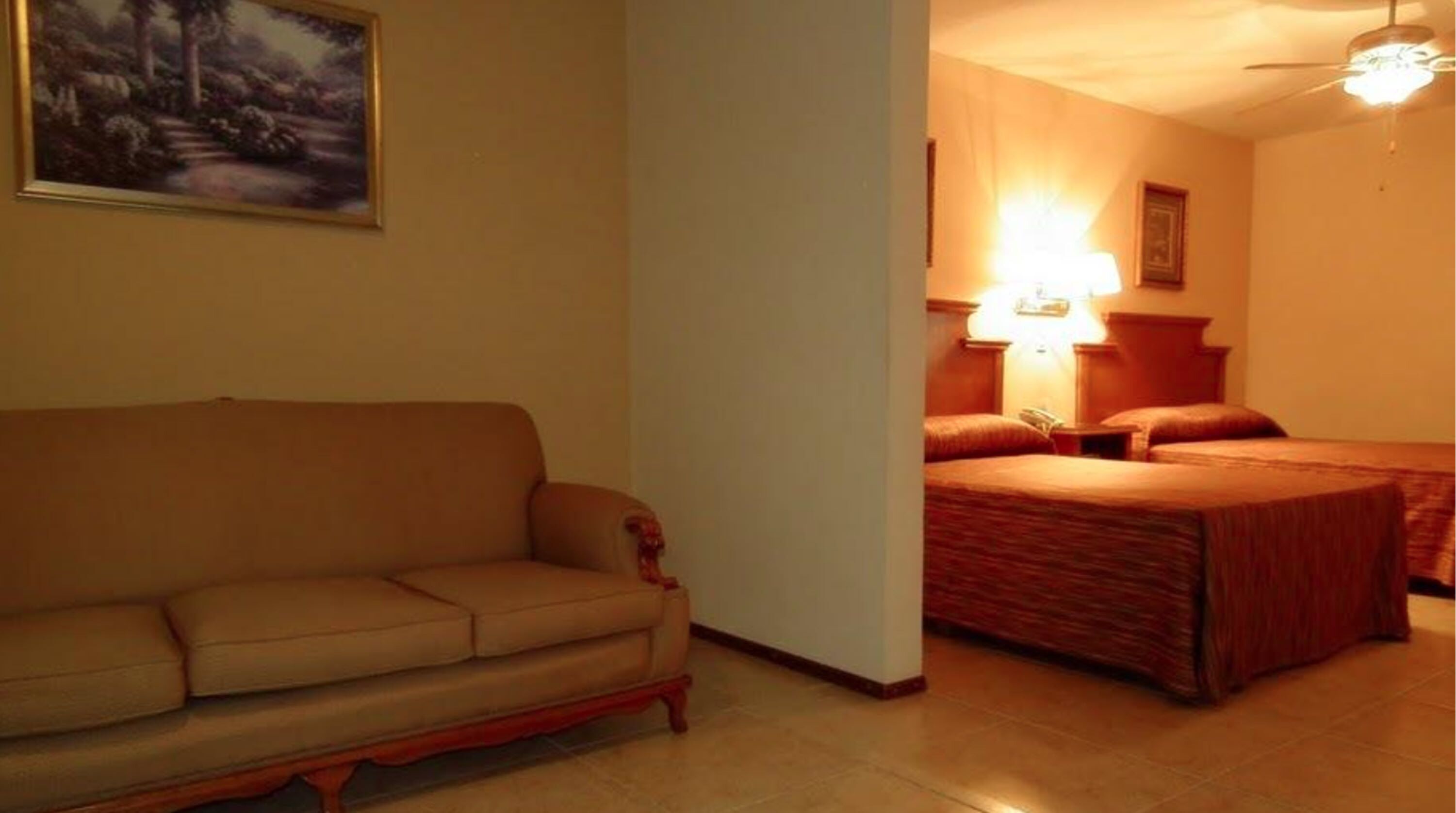 family room | 1 bedroom, in-room safe, individually decorated, individually furnished