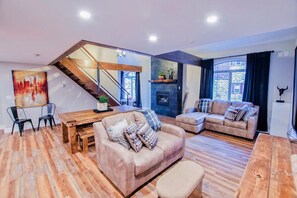 Smart TV, fireplace, books, offices
