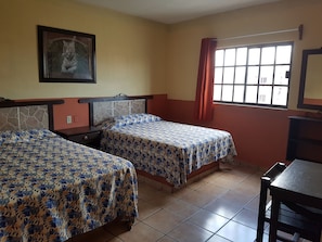 Standard Quadruple Room, 2 Double Beds, Balcony, City View | Individually decorated, individually furnished, blackout curtains