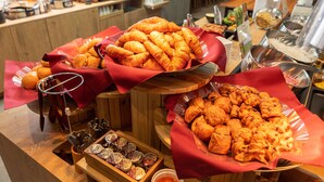 A buffet with various food items including pastries and desserts. - Super Hotel Premier Miyazaki Ichibangai (Miyazaki)