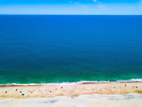 Sea Colony 1st Fl condo, hear the Ocean. Walk out balcony to the pools and beach