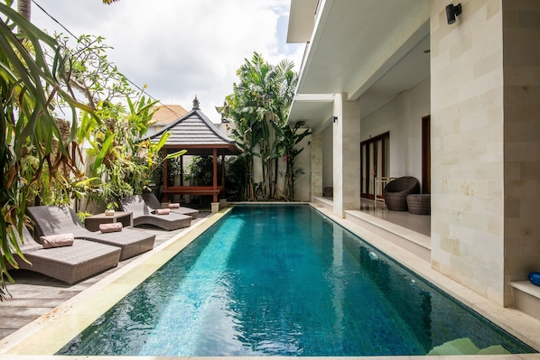 Outdoor pool, pool umbrellas, pool loungers