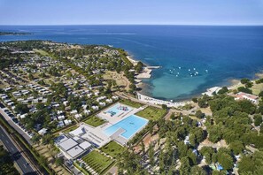 Enjoy a relaxing seaside vacation with easy access to the beach and marina.