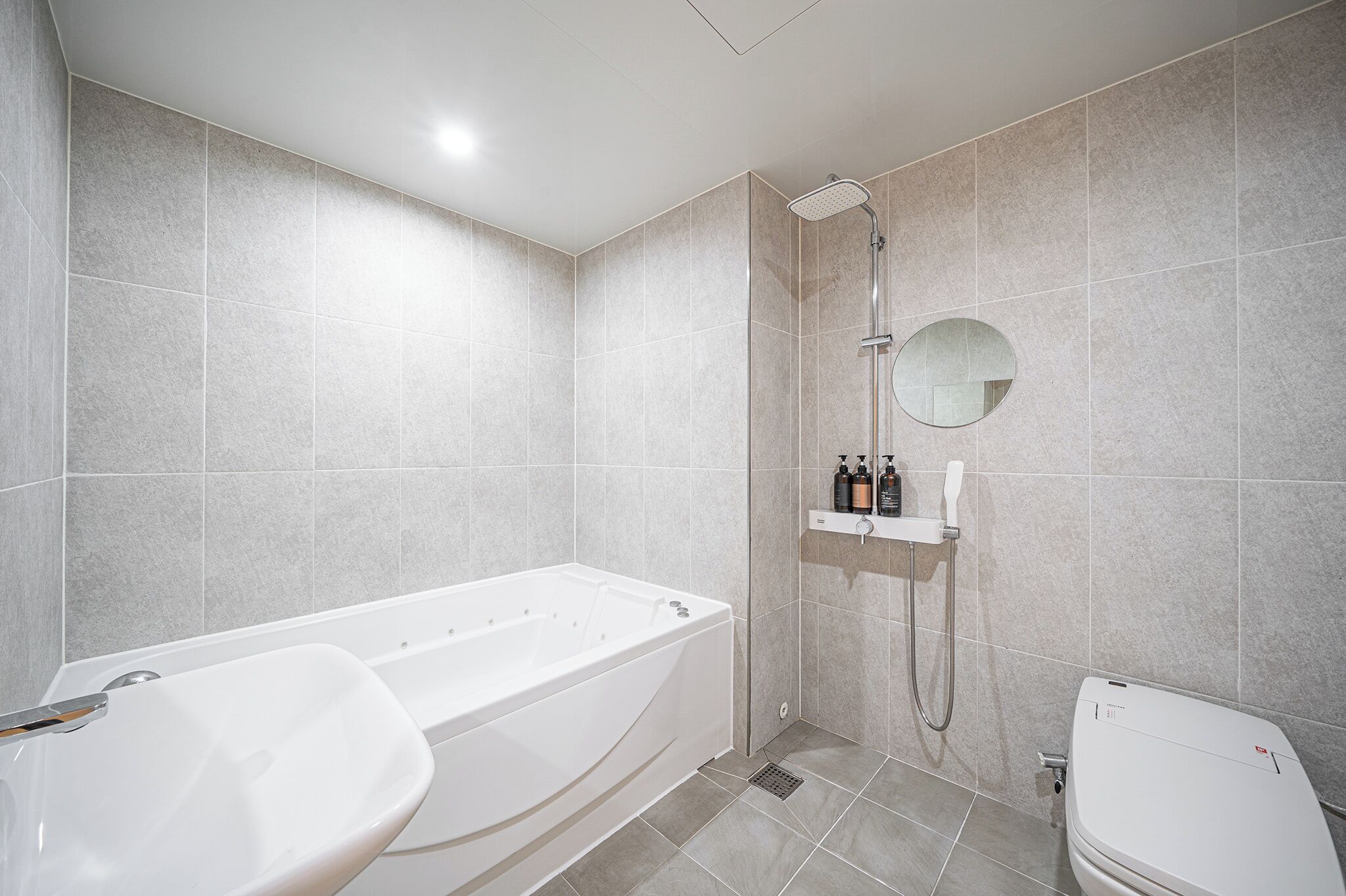 deluxe room | bathroom | separate bathtub and shower, free toiletries, hair dryer, dressing gowns