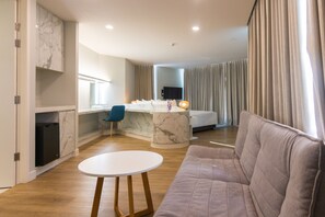 Presidential Suite, 2 Bedrooms | Living area | 32-inch flat-screen TV with digital channels, TV