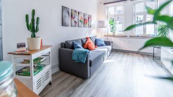 Comfort Studio, 1 Bedroom, Non Smoking, City View | Living area | 55-inch Smart TV with cable channels, TV, video-game console