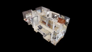 Ein 3D-Modell einer modernen Wohnung mit Wohnzimmer, Küche, Essbereich und zwei Schlafzimmern.