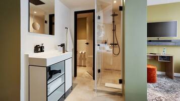 Douche, douche à « effet pluie », articles de toilette de luxe