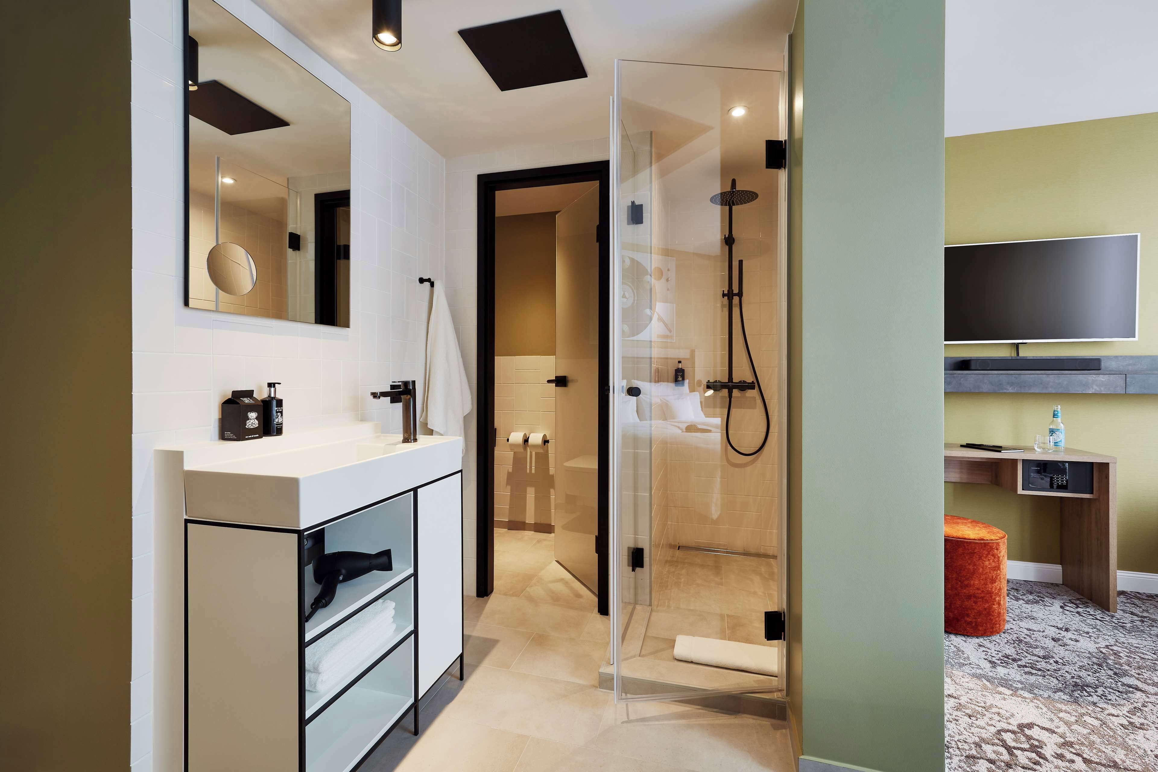 shower, rainfall showerhead, designer toiletries, hair dryer