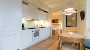 Apartment, 2 Bedrooms | Private kitchen | Fridge, oven, stovetop, dishwasher