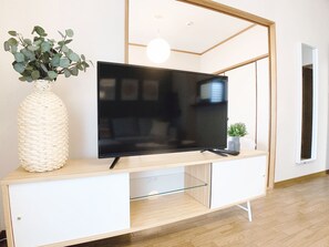 3 Bedroom Apartment with Balcony 303 | Living area - OUCHI HOTEL Dambara (Hiroshima)