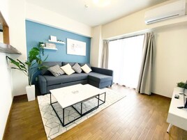 3 Bedroom Apartment with Balcony 703 | Living area | Flat-screen TV