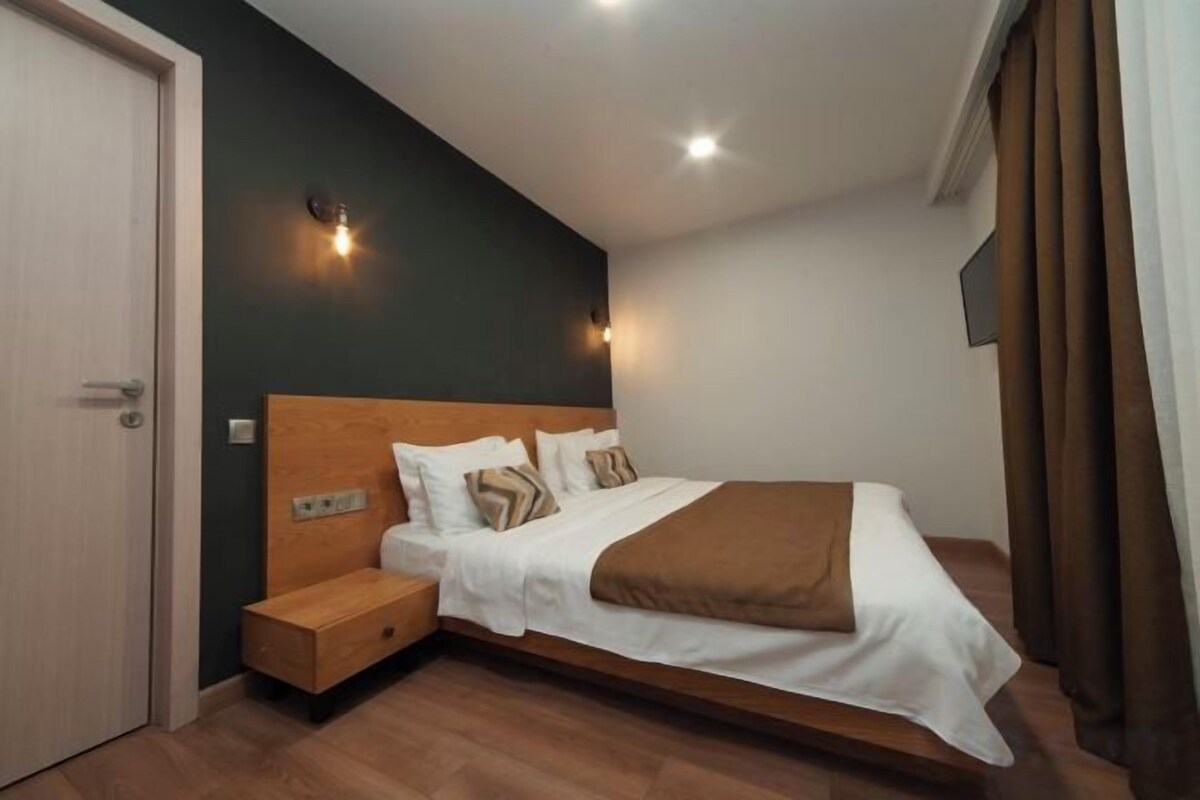 Premium bedding, memory foam beds, in-room safe, desk