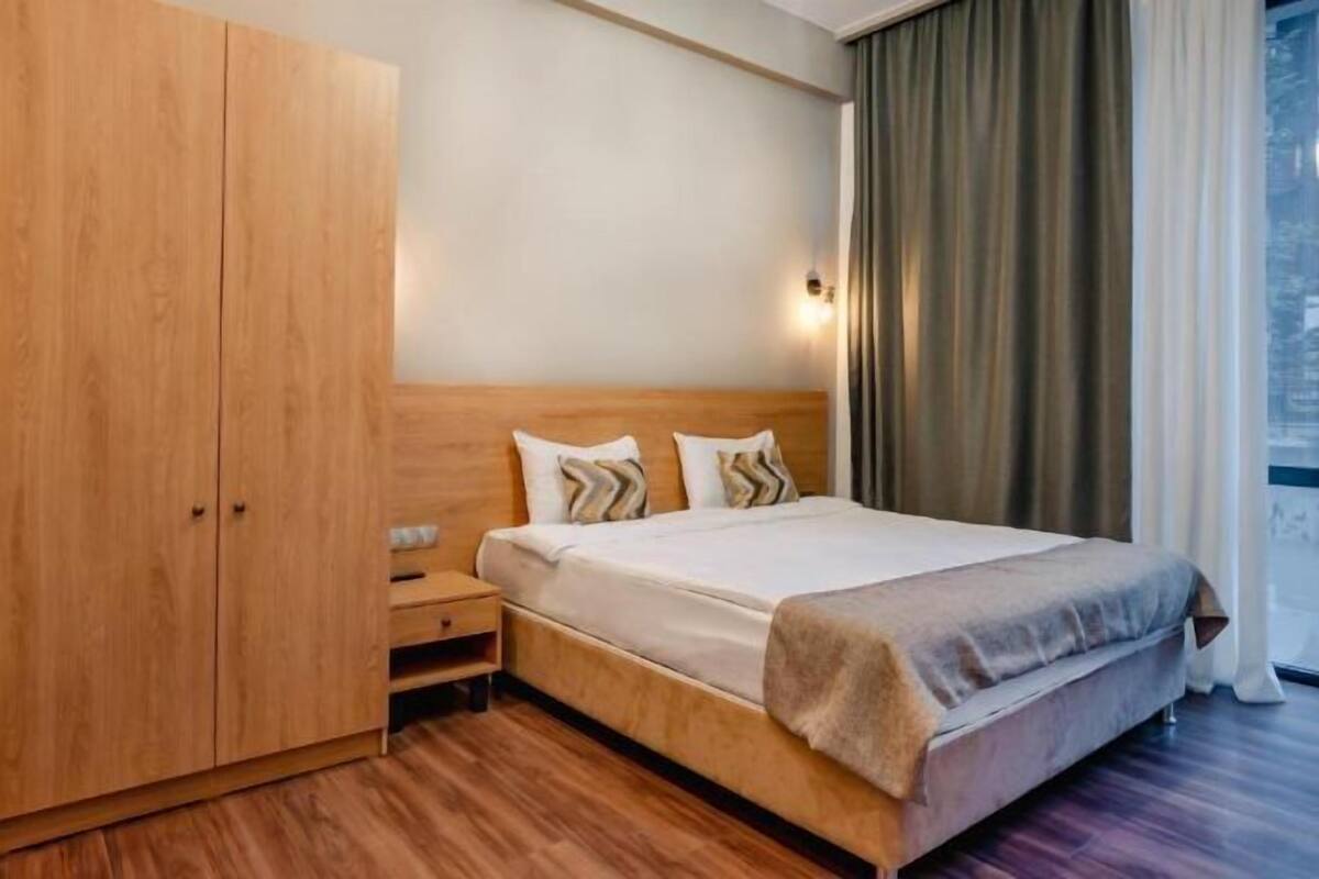 1 habitación y ropa de cama de alta calidad