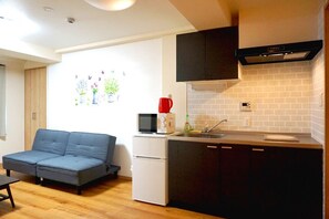 Appartamento (202) | Angolo cottura privato | Mini-frigorifero, microonde, piano cottura, macchina per tè/caffè