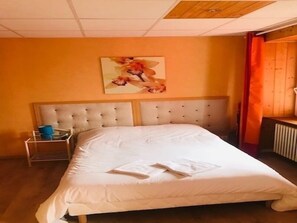 Standard Triple Room | Individually decorated, individually furnished, desk, blackout drapes - Hotel des Cevennes (Mezilhac)