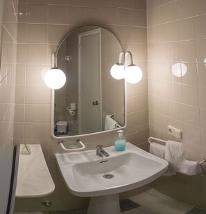 Shower, towels, toilet paper