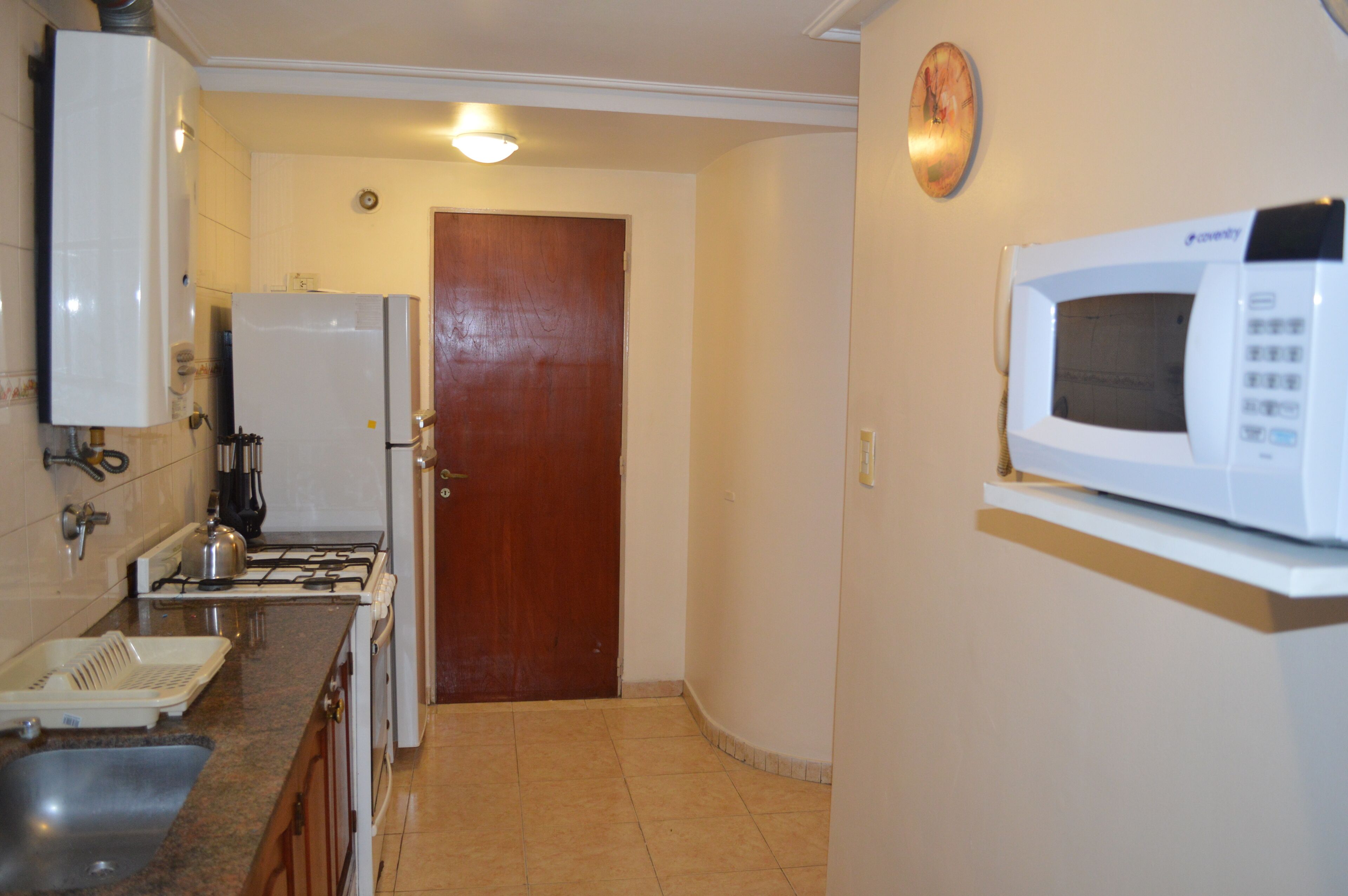 Apartemen Superior | Dapur pribadi | Lemari es besar, microwave, oven, dan kompor