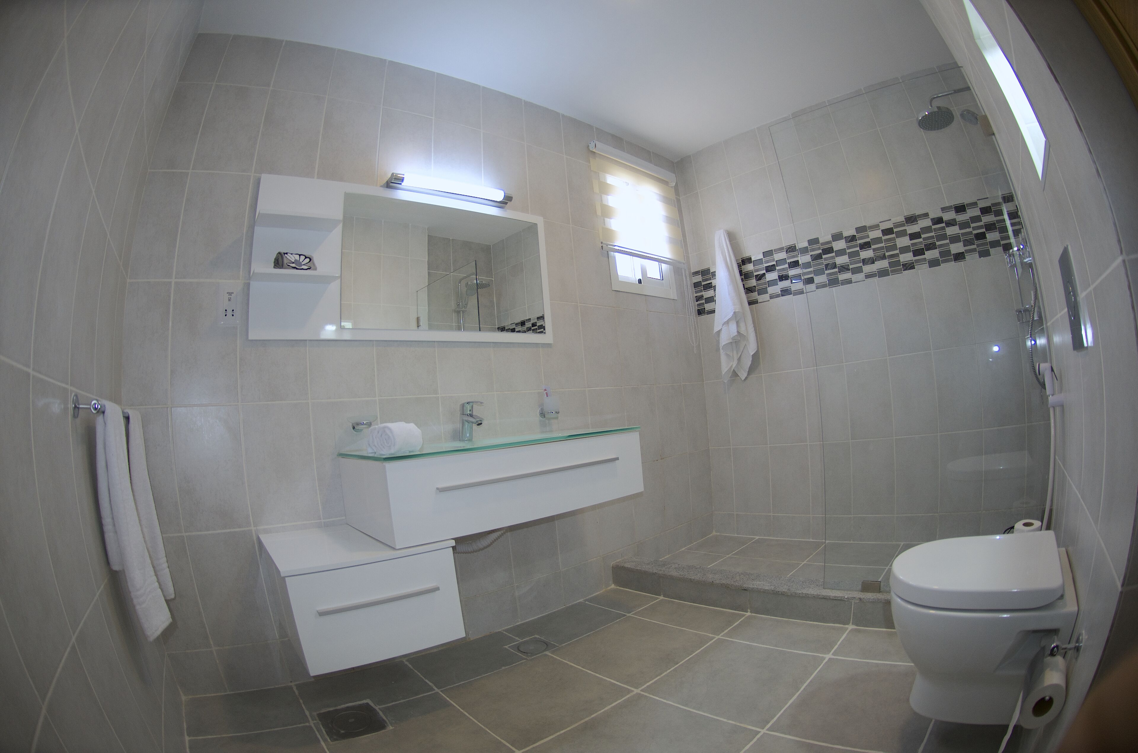 Shower, free toiletries, towels, soap