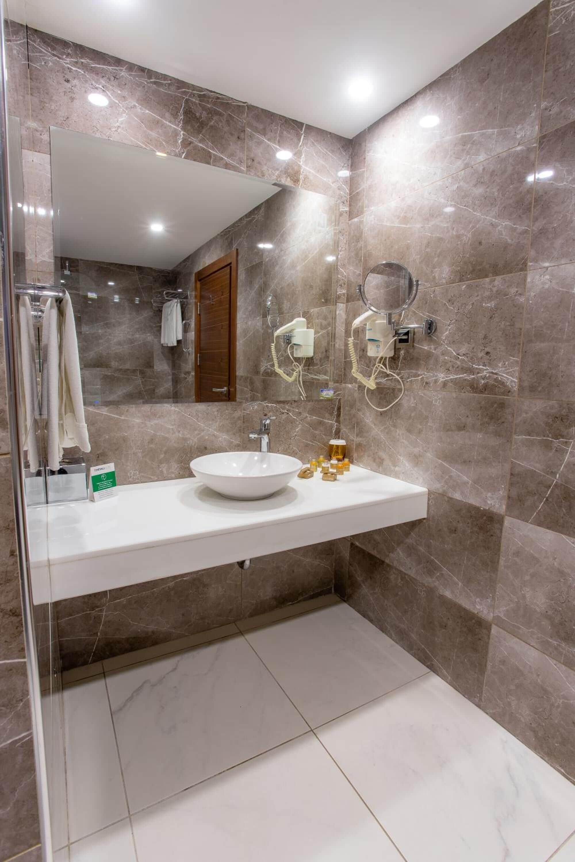 hydromassage showerhead, hair dryer, bathrobes, slippers