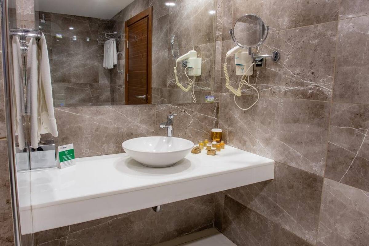 hydromassage showerhead, hair dryer, bathrobes, slippers