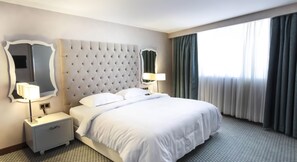 Kamar Single Deluks | Seprai premium, selimut bulu angsa, busa memori, dan brankas