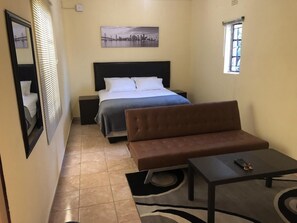Laptop workspace, iron/ironing board, free WiFi, bed sheets