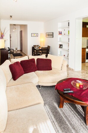 Apartment, 2 Bedrooms | Living room | Flat-screen TV