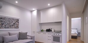 Deluxe-Apartment | Wohnbereich | LED-Fernseher