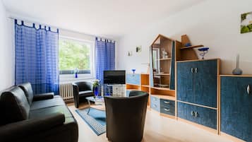 Comfort-Apartment | Wohnbereich | Fernseher