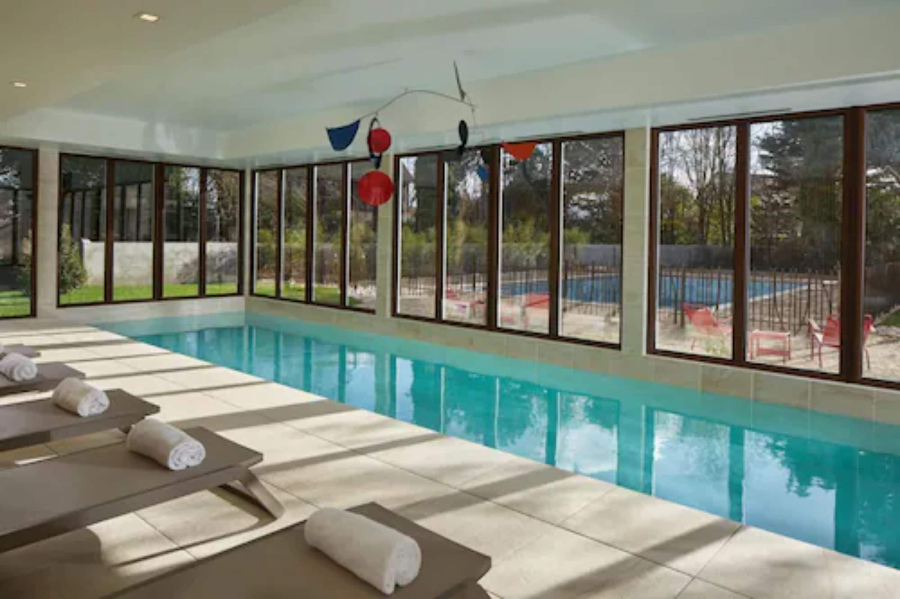 indoor pool, seasonal outdoor pool, pool loungers