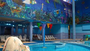 Indoor pool, seasonal outdoor pool, pool umbrellas, sun loungers