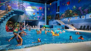 Indoor pool, seasonal outdoor pool, pool umbrellas, sun loungers