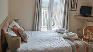 Double Room with Balcony | Desk, iron/ironing board, free cots/infant beds, rollaway beds