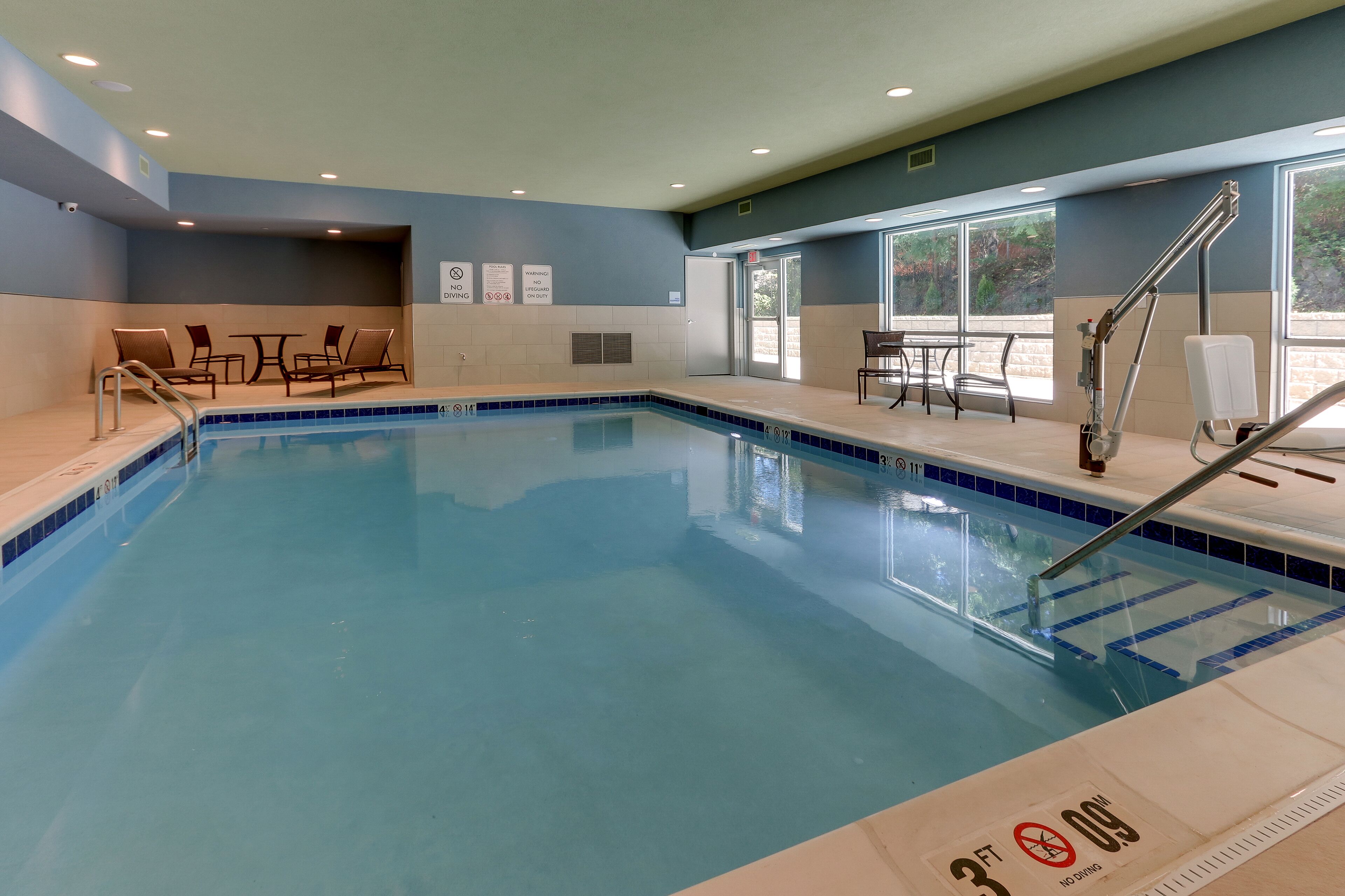 indoor pool, pool loungers