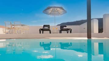 Outdoor pool, pool umbrellas, pool loungers