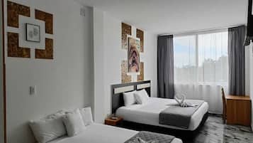 1 bedroom, hypo-allergenic bedding, down comforters, in-room safe