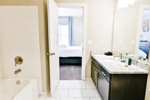 Bathtub, hair dryer, towels