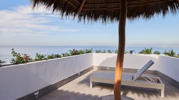 Suite Deluxe con vista al mar 1 cama King Size | Ropa de cama de alta calidad, minibar, caja fuerte