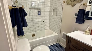 Hair dryer, towels, soap, shampoo