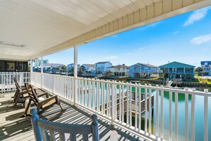 Terrace/patio - High Tide - A Fisherman's Delight:  4 BR Channel Home w/ Boat Ramp in Cherry Grove (North Myrtle Beach)