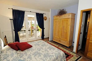 1 bedroom, desk, iron/ironing board, travel cot