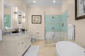 Bathtub, hair dryer, towels, soap