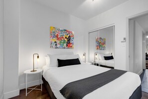 1 bedroom, desk, iron/ironing board, travel cot